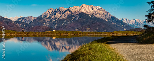 Fototapeta Naklejka Na Ścianę i Meble -  Beautiful alpine autumn or indian summer landscape shot with reflections in a lake at the famous Streuboeden summit, Fieberbrunn, Tyrol, Austria