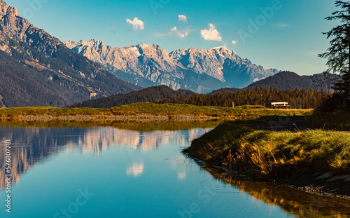 Beautiful alpine autumn or indian summer landscape shot with reflections in a lake at the famous Streuboeden summit, Fieberbrunn, Tyrol, Austria