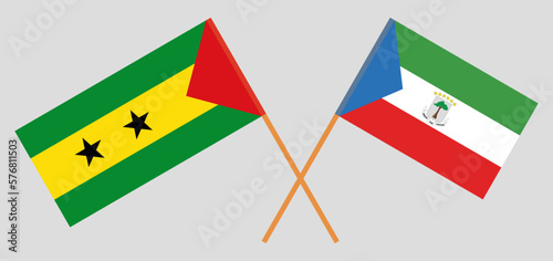 Crossed flags of Sao Tome and Principe and Equatorial Guinea. Official colors. Correct proportion