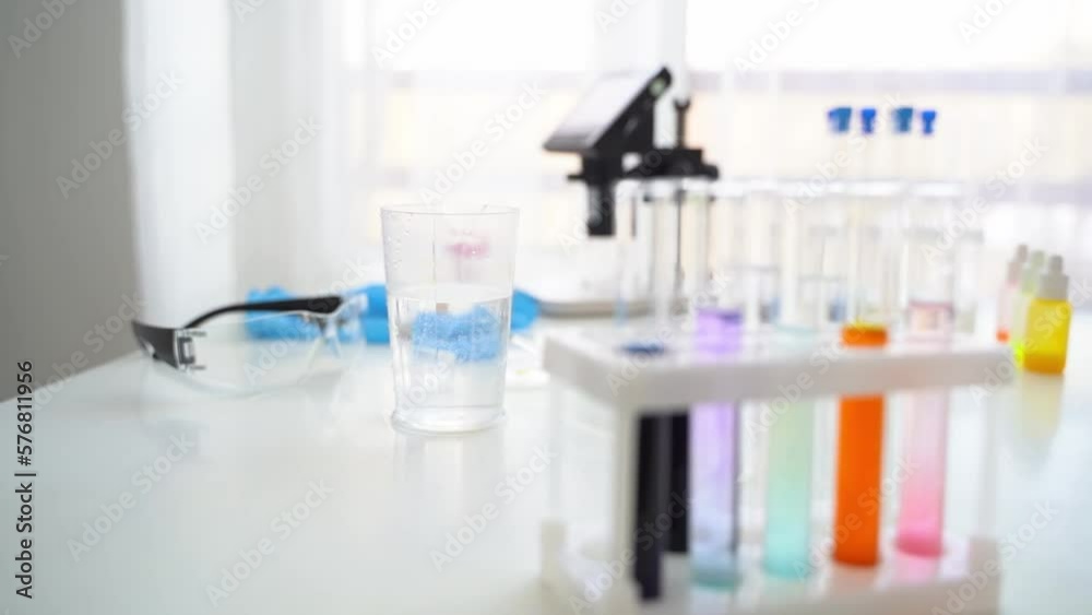 a student conducts chemical experiments in a chemical laboratory a student conducts chemical experiments in a chemical laboratory