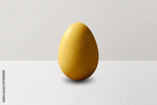 yellow Egg in front of a white wall and on a white floor