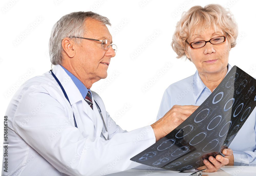 Doctors team talking expertise in hospital with mri scans Doctors team talking expertise in hospital with mri scans