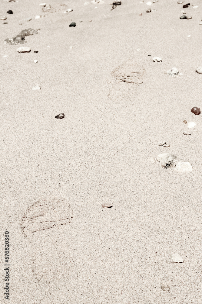 Beautiful footprints in the sand sea nature background Beautiful footprints in the sand sea nature background