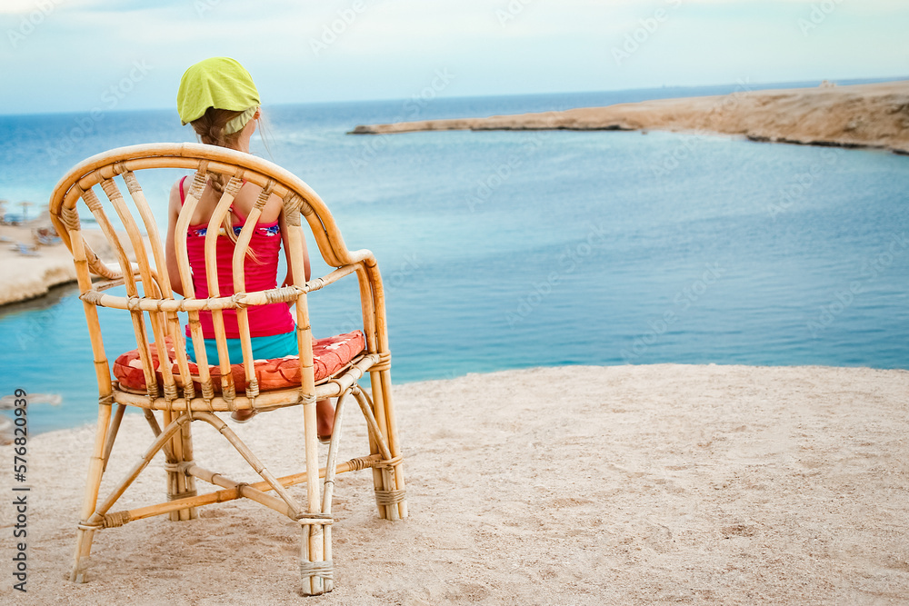 Happy child playing on the sea background Happy child playing on the sea background