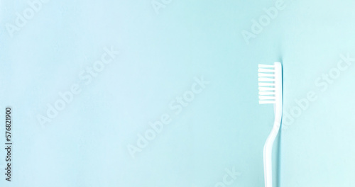New toothbrush close-up on a blue background. Professional Dental concept.