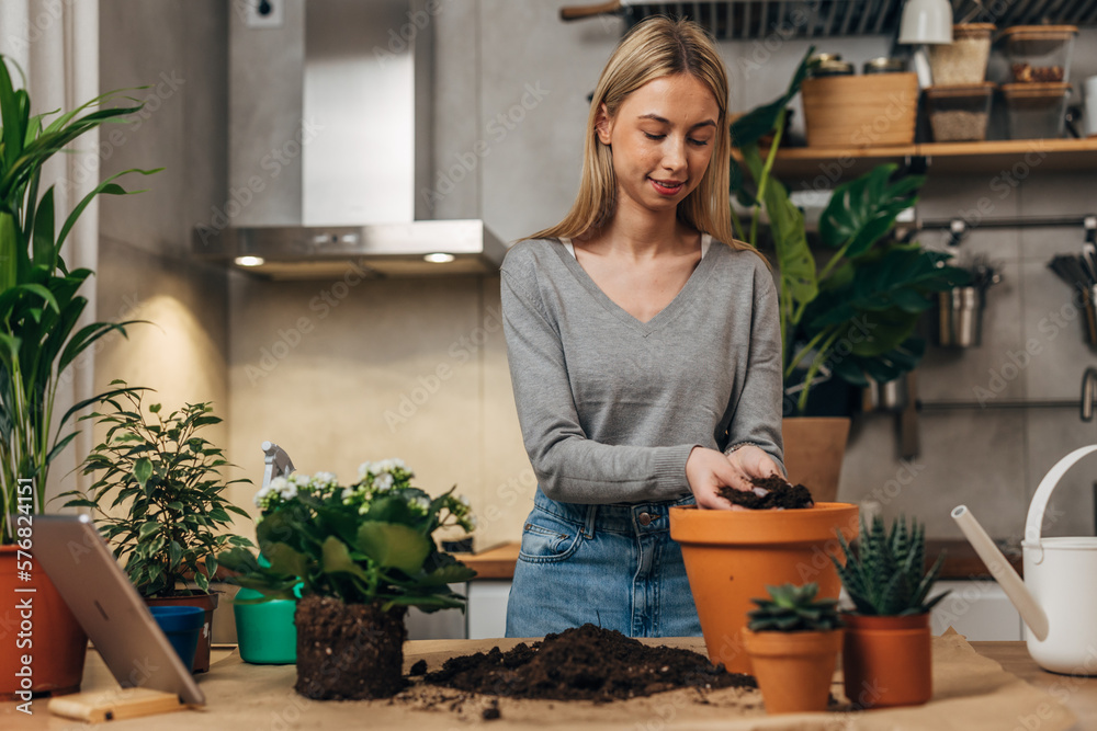 Front view of a florist working with plants Front view of a florist working with plants