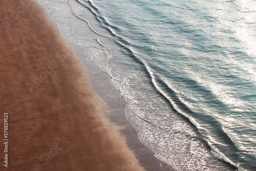 Fototapeta Naklejka Na Ścianę i Meble -  gentle waves with beach at the persian gulf