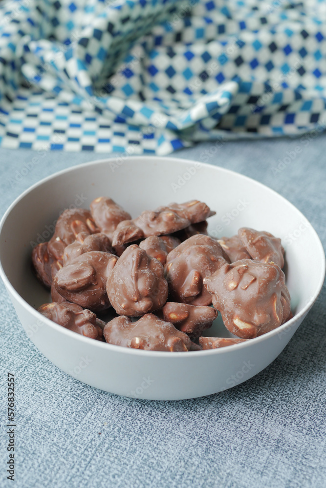 close up of peanut chocolate candy on table close up of peanut chocolate candy on table