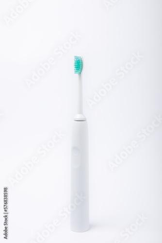 Electric toothbrush isolated on white background.