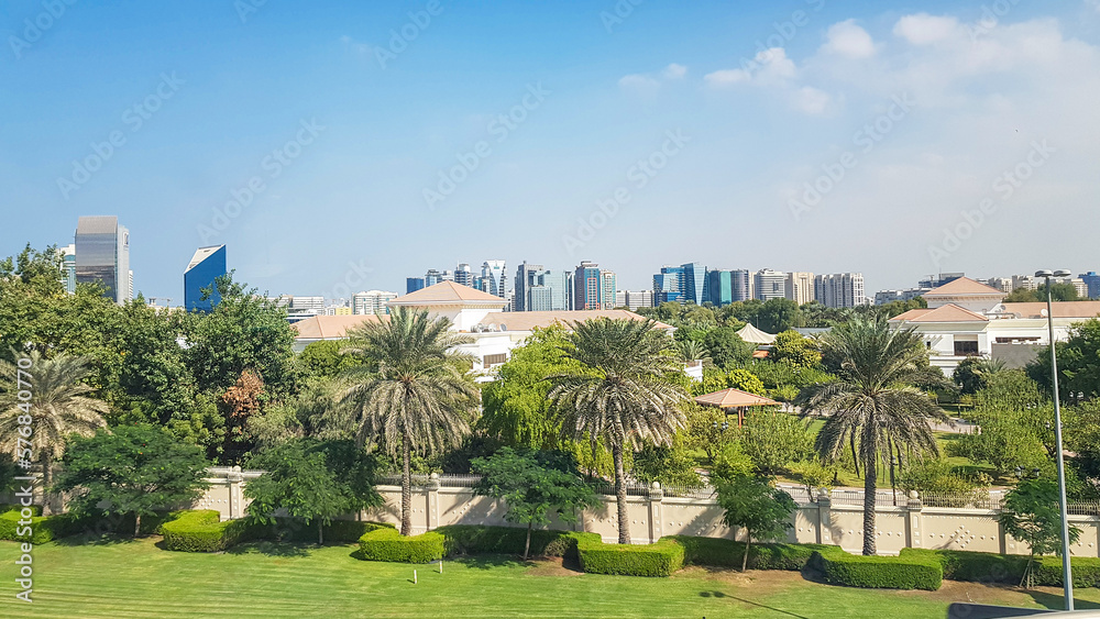 Panoramic view of Dubai City with skyscrapers, avenues and parks with green palm trees, Dubai, UAE