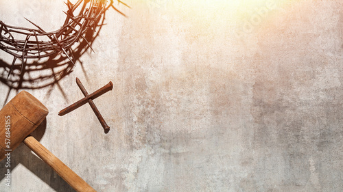 Crown of thorns  cross and mallet on grunge background with space for text. Good Friday concept