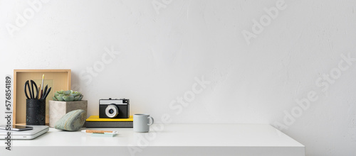 Desk. Home office, creative workspace with office supplies and empty table space. © mallmo