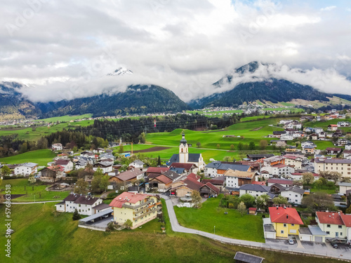 Aerial view Oberperfuss town in Tirol Austria by drone.