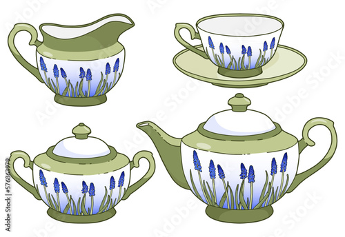 Elegant tea set isolated on white. Beautiful crockery decorated with blue flowers. Green tableware.