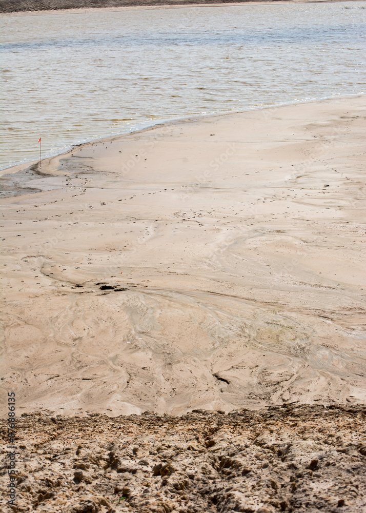 Abstract dirt and sand pattern next to lake Abstract dirt and sand pattern next to lake