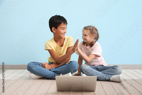Happy diverse children high...