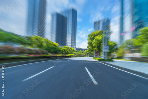 empty asphalt road through modern city in China.