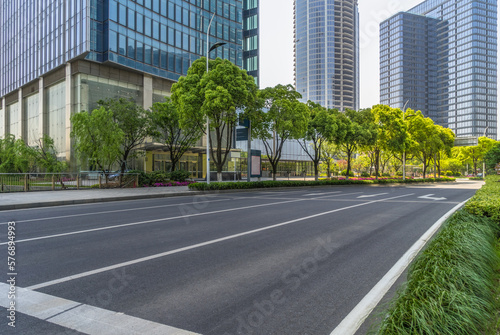 empty asphalt road through modern city in China.