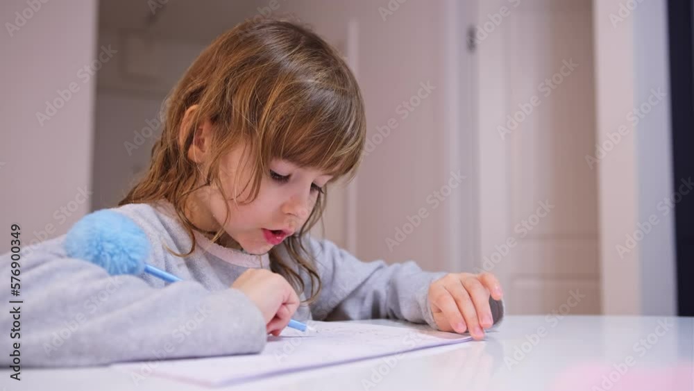 Smart Young Caucasian Girl Preshooler Doing Math Homework Counting Numbers with Her Fingers Smart Young Caucasian Girl Preshooler Doing Math Homework Counting Numbers with Her Fingers