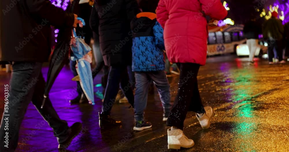 People crossing wet street at night with bright lights and charisms and new year decorations, footpath,
Niagara Falls Canada People crossing wet street at night with bright lights and charisms and new year decorations, footpath,
Niagara Falls Canada