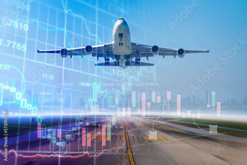 Double exposure airplane commercial and cargo business transportation with investing and stock market chart growth graph background.
