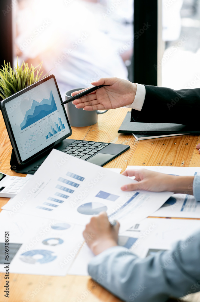 © NAMPIX - Young business teamwork working with business report document on office desk. People Design Planning, Brainstorming Planning Partnership. © NAMPIX - Young business teamwork working with business report document on office desk. People Design Planning, Brainstorming Planning Partnership.