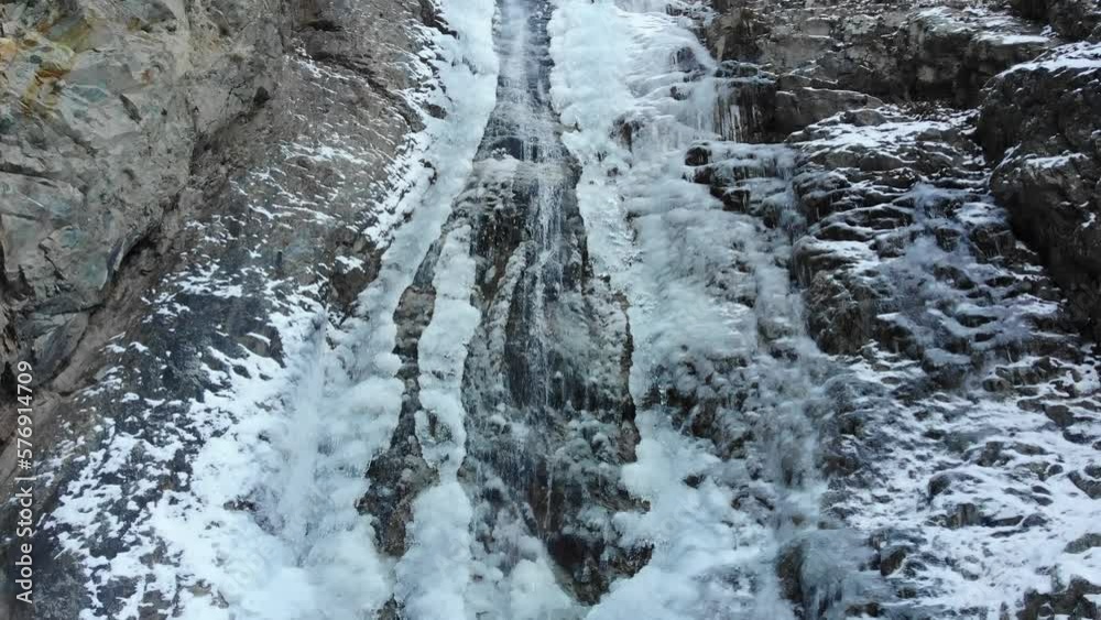 Caucasus, North Ossetia. Tsey Gorge. Winter mountain stream. Caucasus, North Ossetia. Tsey Gorge. Winter mountain stream.