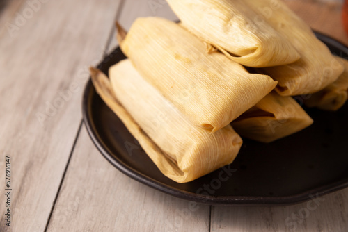 Tamales. Prehispanic dish typical of Mexico and some Latin American countries. Corn dough wrapped in corn leaves. The tamales are steamed.
