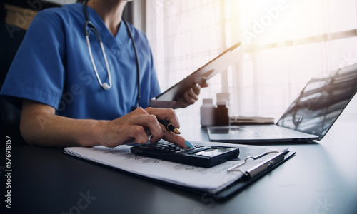 Medicine doctor working with digital medical interface icons on the hospital background, healthcare and Medical technology and network concept.