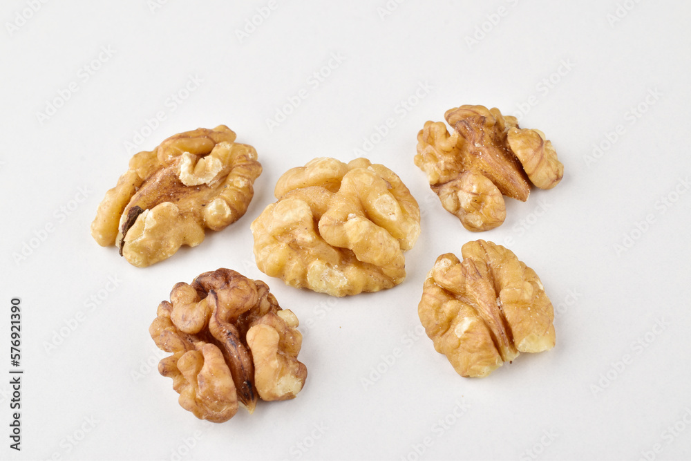 Ripe walnut without shell on white background Ripe walnut without shell on white background