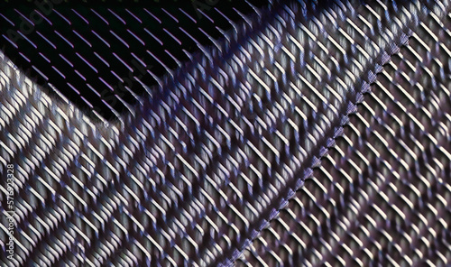 A close-up of the woven texture of carbon fiber material, with its distinct pattern of intersecting lines