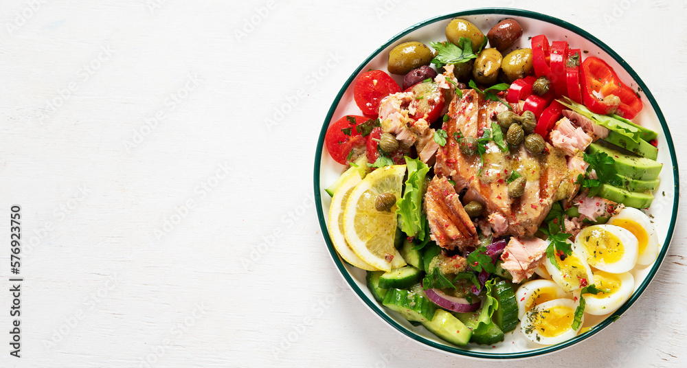Tuna salad with lettuce, eggs and tomatoes. Tuna salad with lettuce, eggs and tomatoes.