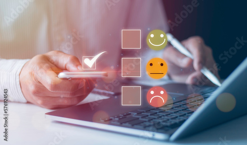 Businessman choosing feedback symbols on the icon from Negative to Positive review, poor to excellent, hate to love, best quality, Client's Satisfaction Surveys, Customer service evaluation concept