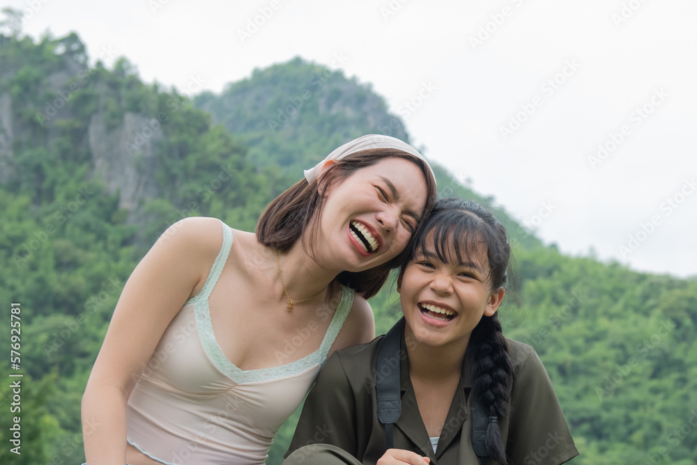 people and friendship concept - happy smiling teenage girls, Portrait of beautiful woman smiling and looking away at park during sunset. Happy cheerful girl laughing at park.