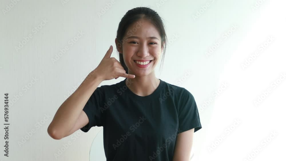 Call sign, Bright young asian woman inviting to call isolated on white background, Suggest to call or invite to apply for membership, Isolated on yellow background... Call sign, Bright young asian woman inviting to call isolated on white background, Suggest to call or invite to apply for membership, Isolated on yellow background...