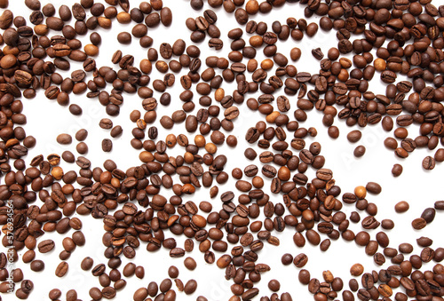 Roasted coffee beans isolated on white background.