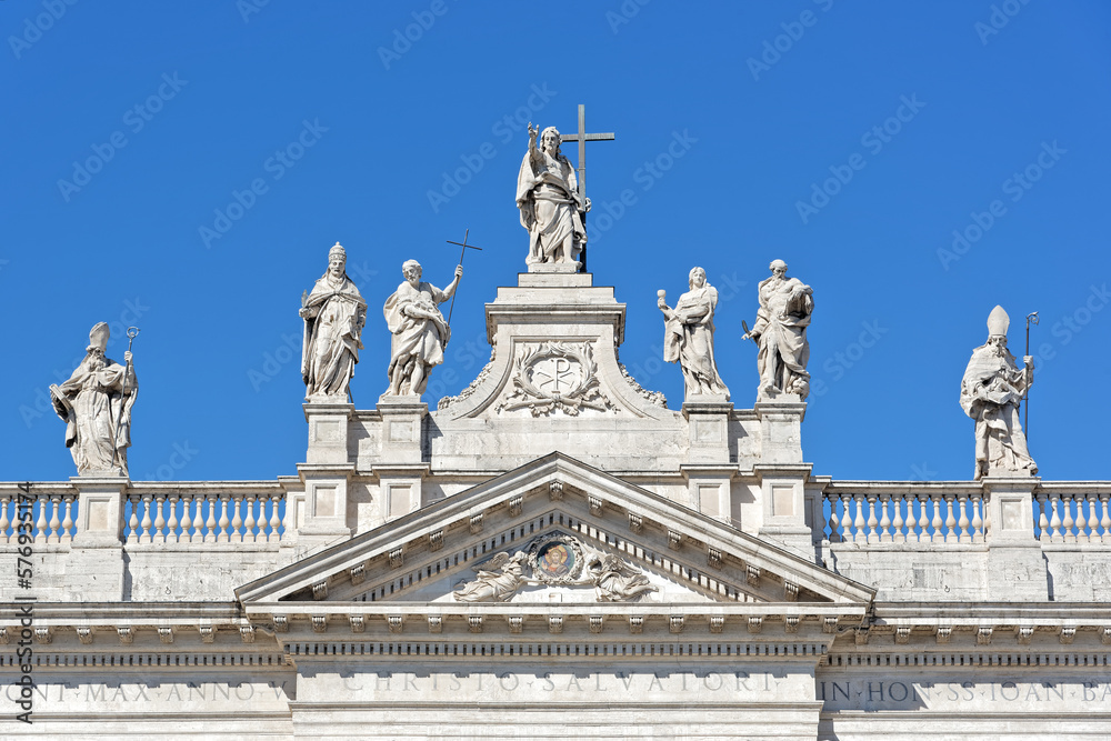 Exterior detail with sculptures from Archbasilica of St.John Lateran, San Giovanni in Laterano in Rome, the official ecclesiastical seat of the Bishop of Rome 