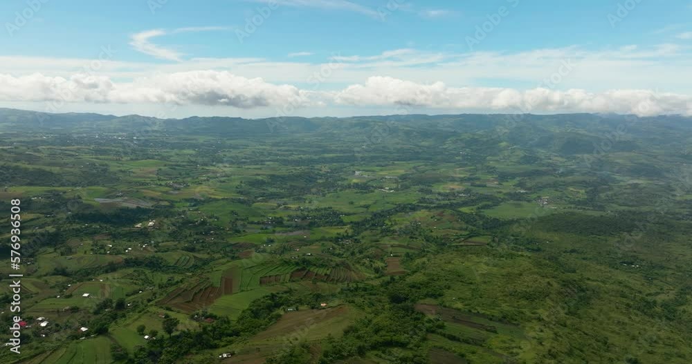 Aerial view of valley with farmland and agricultural land in mountainous area. Negros, Philippines Aerial view of valley with farmland and agricultural land in mountainous area. Negros, Philippines