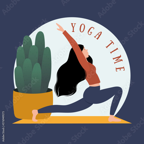 The girl does yoga. A woman is doing physical exercises. A girl in a T-shirt and leggings.