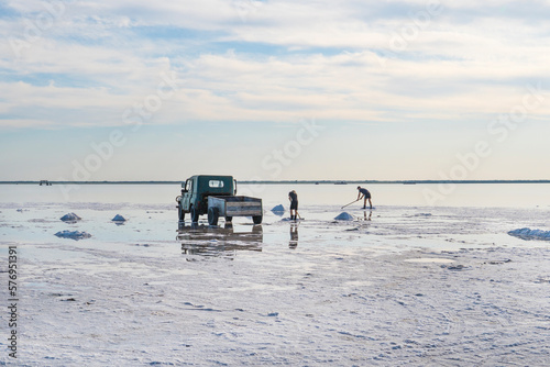 Salt mining on lake burlinskoye. Bursol'. Altai. Russia. Salt piles and water pool on Salinas Grandes salt flats