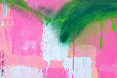 Fototapeta Naklejka Na Ścianę i Meble -  Messy paint strokes and smudges on an old painted wall. Colorful drips, flows, streaks of paint and paint sprays