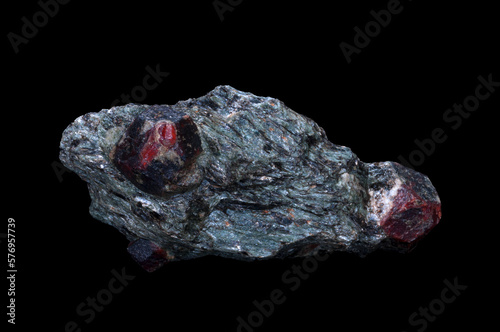 The garnet group includes a group of minerals that have been used since the Bronze Age as gemstones and abrasives. Isolated in black background.