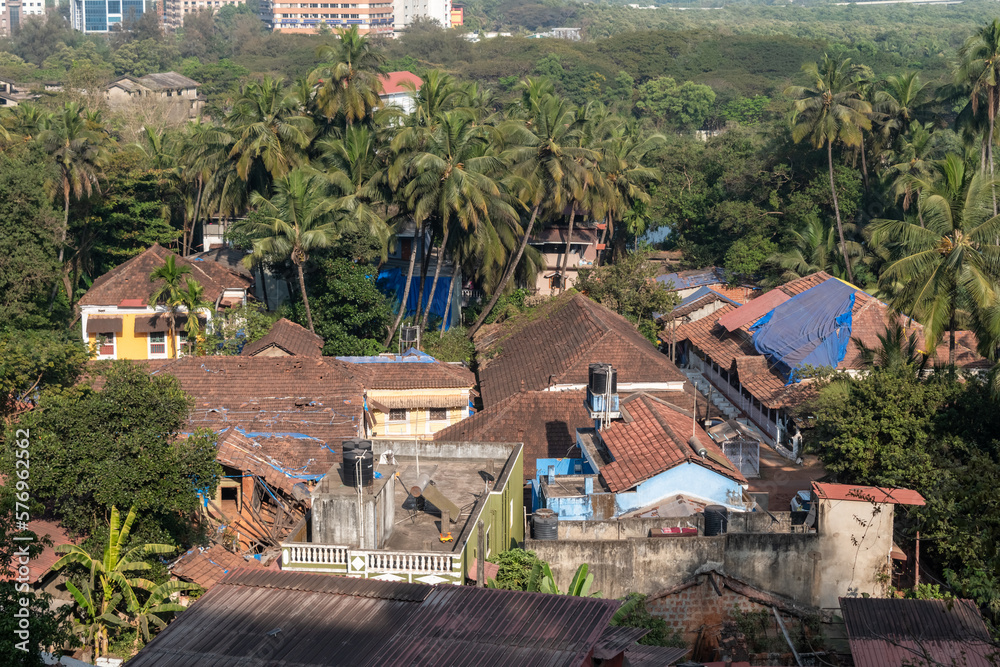 Fototapeta premium Aerial view of the tiled roofs of old houses in the Fontainhas district of Panaji.