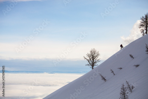 A backcountry skier skins up a ridge on Gash Point in the Bitterroot Mountain Range, Montana.