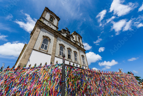 Colorful Bonfim wish ribbons tied around at Church of Nosso Senhor do Bonfim photo