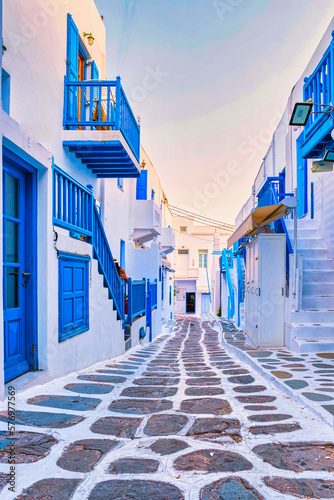 Fototapeta Naklejka Na Ścianę i Meble -  empty street of Mykonos Greek village in Greece, colorful streets of Mikonos village.