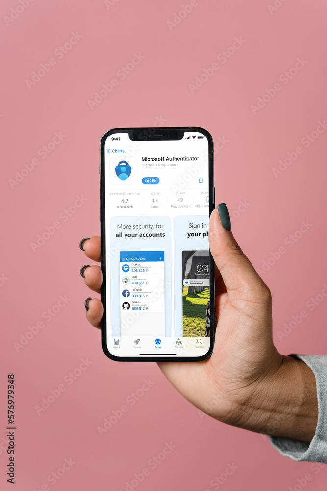 Mobile phone with Microsoft Authenticator App Store screen Stock Photo