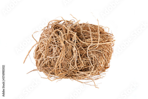 Overhead view of dried vetiver root (Vetiveria zizanioides), isolated on white background photo