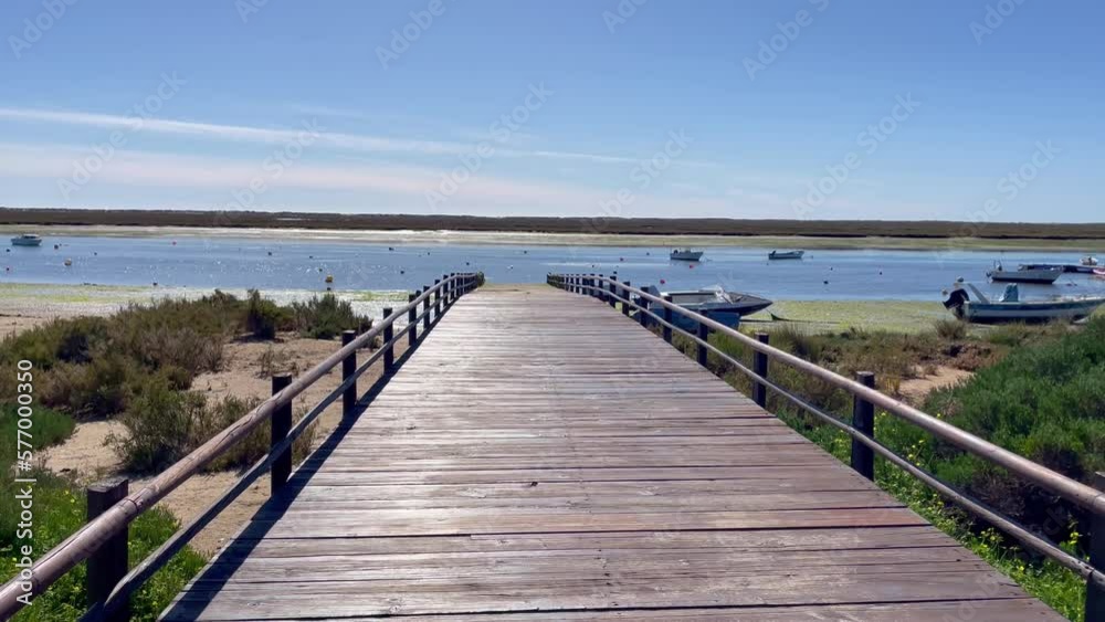 Walkway to the sea, warm summer days Algarve Portugal Walkway to the sea, warm summer days Algarve Portugal