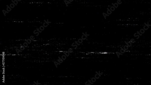 Black distressed grunge texture with white grainy marks
